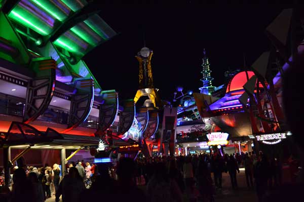 Tomorrowland shines at night in The Magic Kingdom.