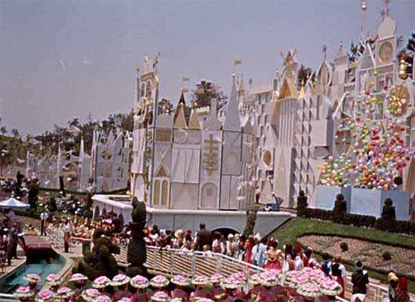 Balloons and doves fly at the opening of "it's a small world" in Disneyland Around the Seasons.