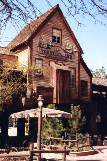 The Frontierland train station in The Magic Kingdom bridges the styles of Splash Mountain and Big Thunder Mountain.