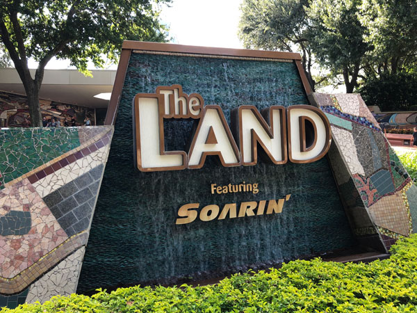 The sign for The Land pavilion in EPCOT
