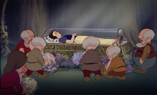 The dwarfs grieve for the loss of their friend in Snow White and the Seven Dwarfs, the first of the Friday Night Movies.