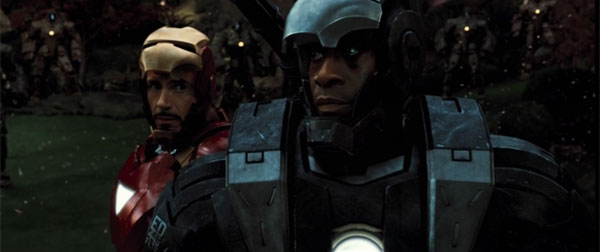 Don Cheadle and Robert Downey Jr. stare down a horde of drones in the 3rd MCU film.