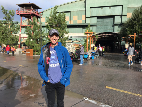 Brett Nachman of Notably Disney stands outside Soarin' Over California.