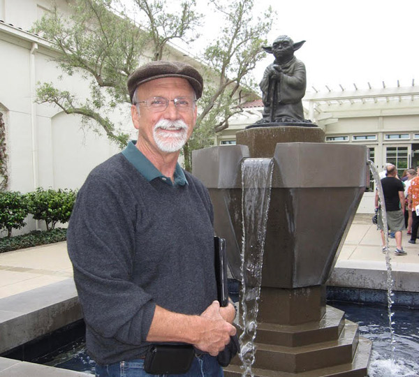 Chris poses out in front of the Yoda statue at the Lucasfilm headquarters.
