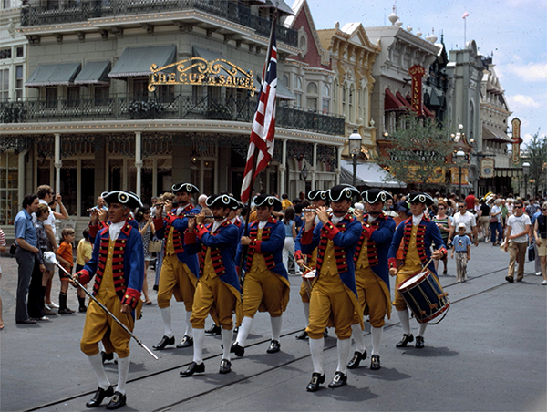 The Fife and Drum troupe close out the Character Parade on Main Street, U.S.A. at the Magic Kingdom.