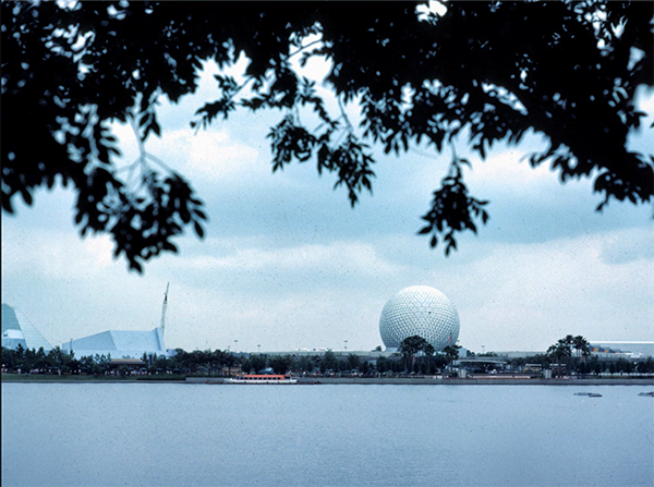A view of Spaceship Earth and the construction crane above The Living Seas at Future World in EPCOT Center in 1984.