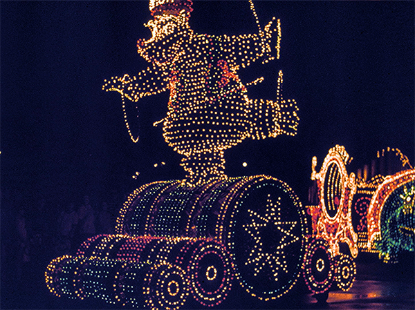 A bear dances on barrels in the Dumbo section of Disney's classic Main Street Electrical Parade.