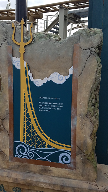 The middle section of Pantheon is explained as connecting to Neptune through this sign in the queue.