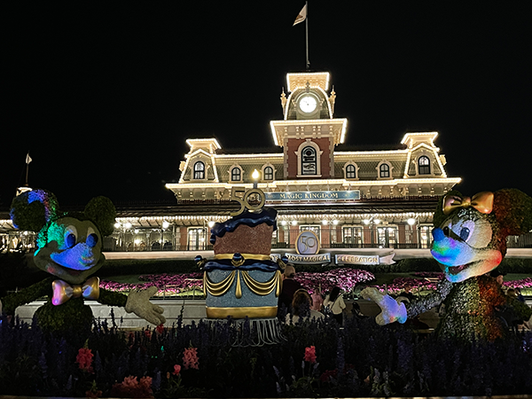 The Train Station at Main Street, U.S.A. is all lit up at night while celebrating the 50th Anniversary of Walt Disney World.